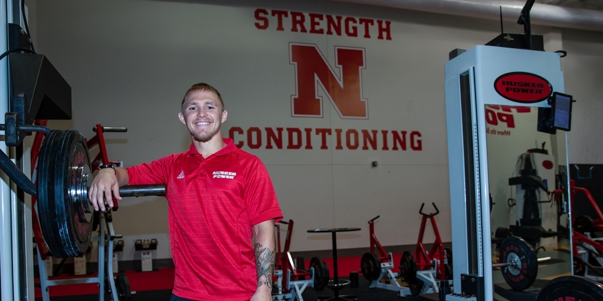A student poses during his strength and conditioning internship.