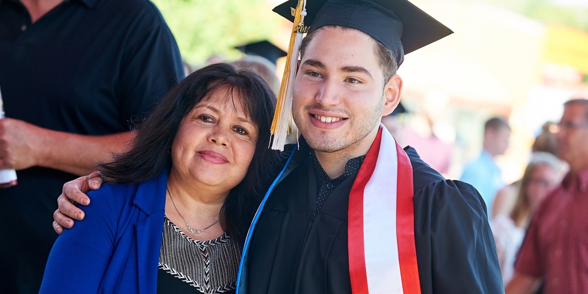 Student with mother at commencement
