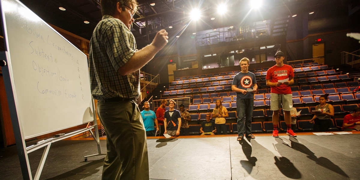 A Northwestern professor leads a theatre exercise.