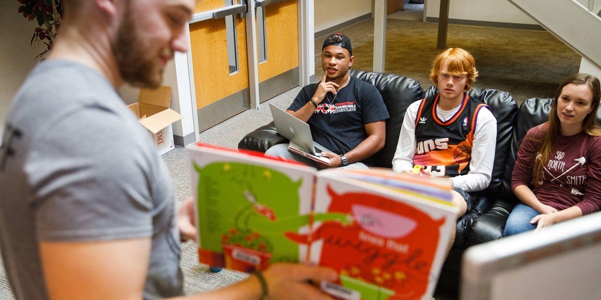 An education major prepares for an assignment in Children's Literature.