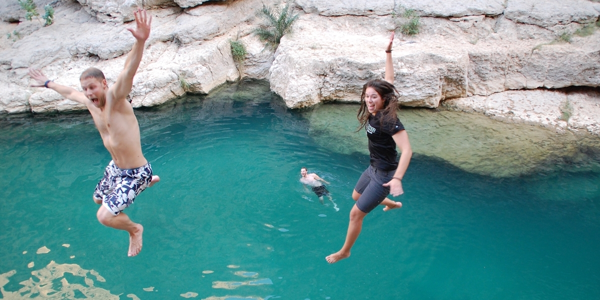 Northwestern students go cliff jumping during their time in Oman.