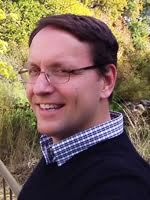 Dr. Justin Adcock