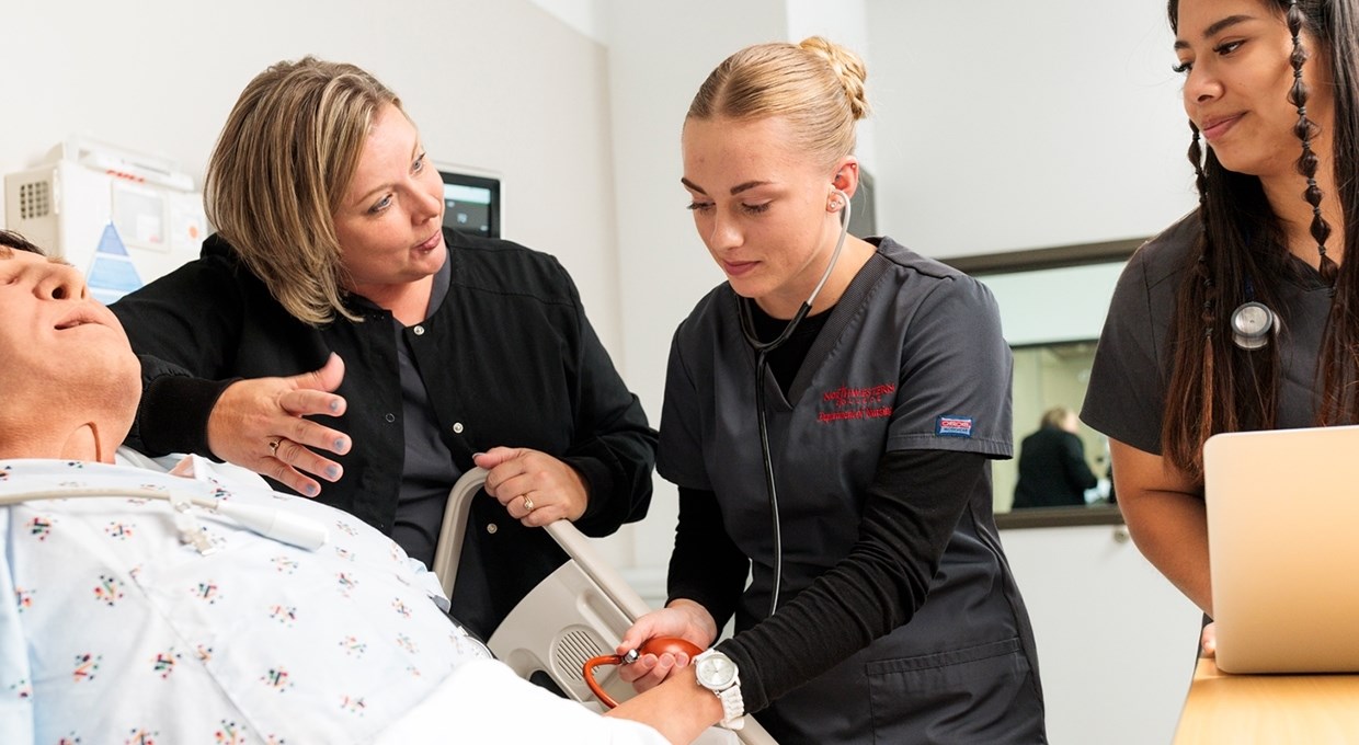 New nursing grads record 100 percent first-time exam pass rate