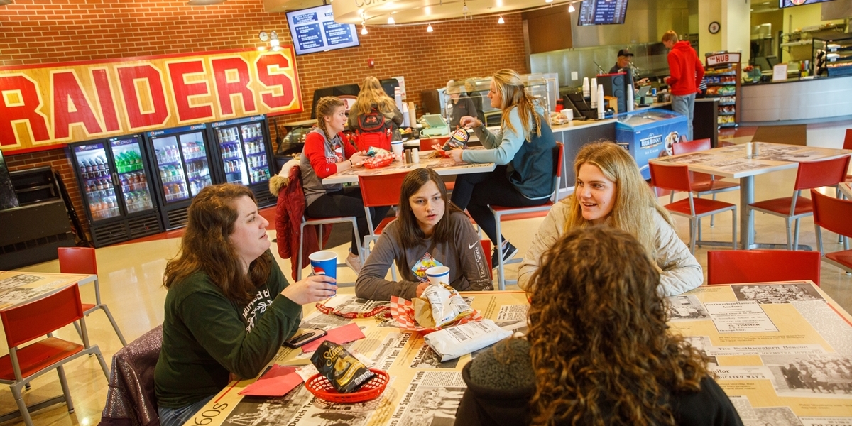 Students eating at The Hub