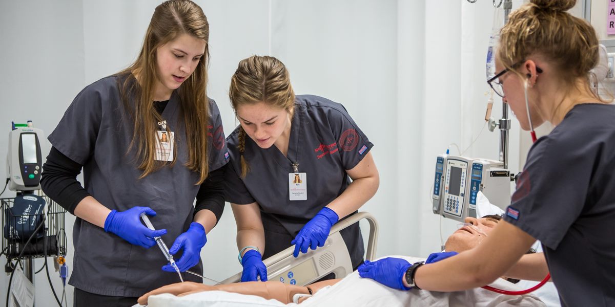 Students in a nursing lab in DeWitt Family Science Center.