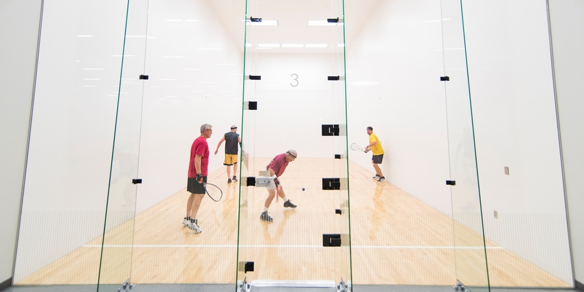 Students play racquetball in the DeWitt Physical Fitness Center.