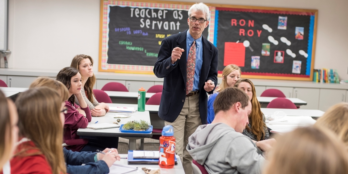 A Northwestern education professor lectures during class.