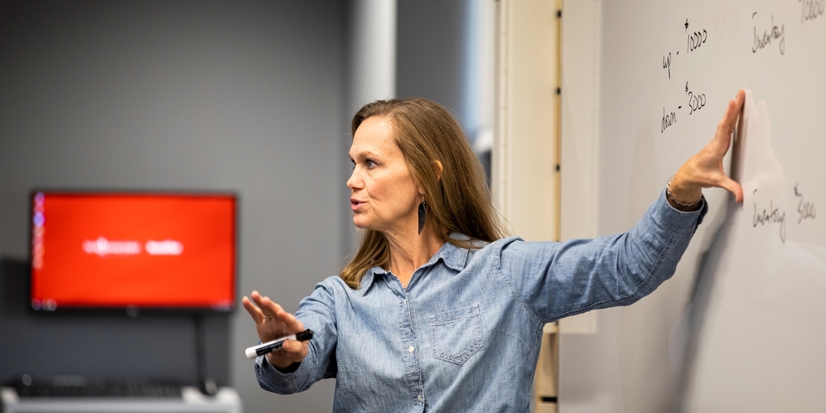 Business professor Vonda Post lectures in an accounting class.