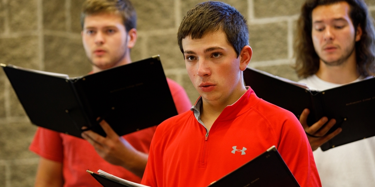 Members of the A cappella Choir rehearse.