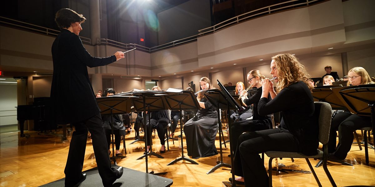 Dr. Angela Holt directs the Symphonic Band in Christ Chapel.