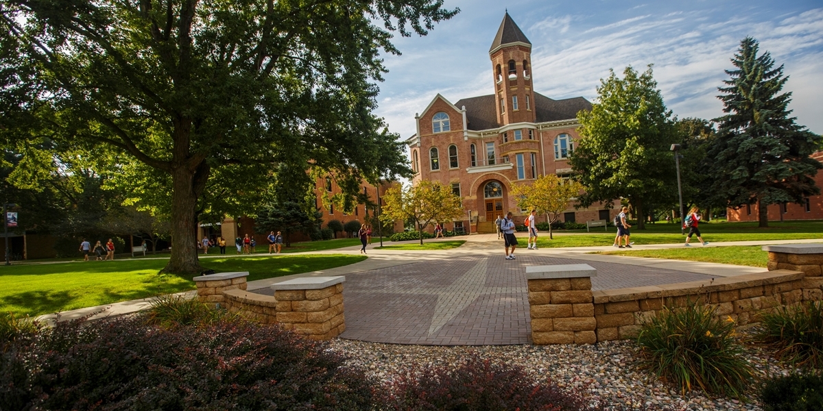 Students walk past Zwemer Hall.