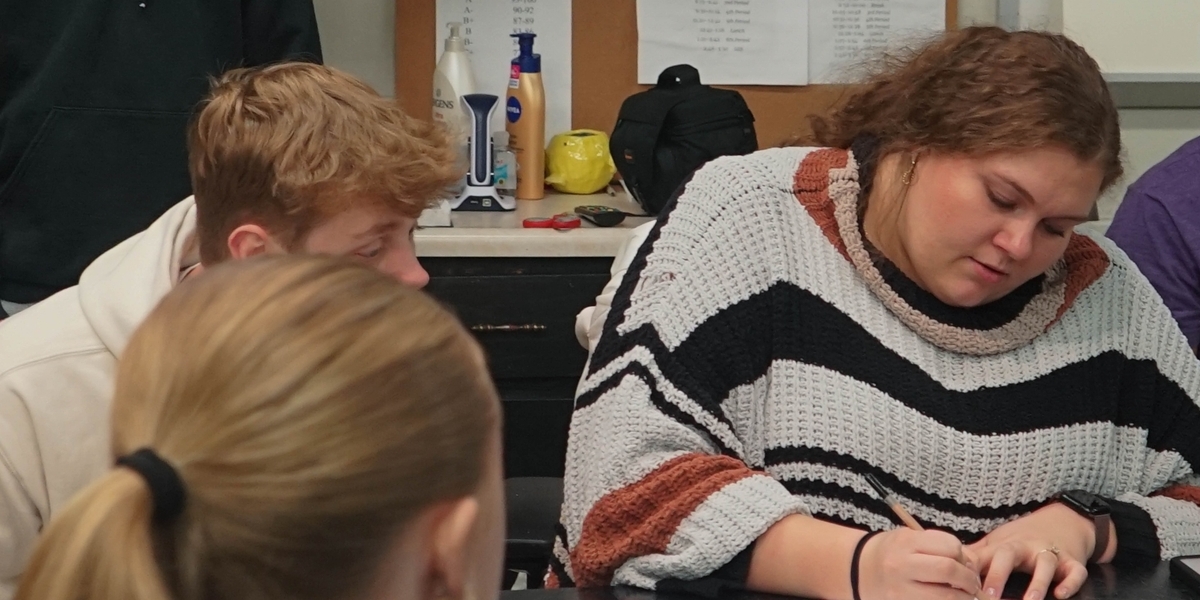 <div class='profile-name'>Emily Ariko</div>