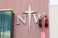 Installation of Northwestern logo on side of new science building