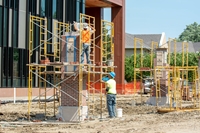Construction of pillars by the the Jack and Mary DeWitt Family Science Center